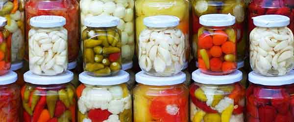 Glass jars of preserved vegetables